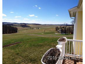 579 Shirey Road Swoope, VA 24479 - Photo 32 of 36 a view of a wooden deck and garden