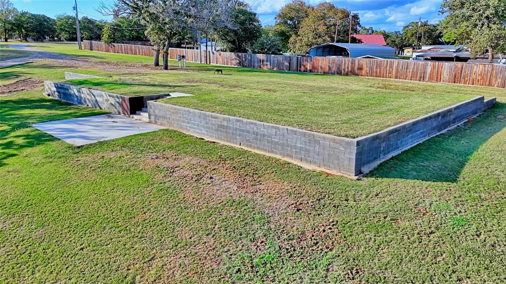 1 Tradewinds Nocona, TX 76255 - Photo 22 of 37 a view of a garden with a house