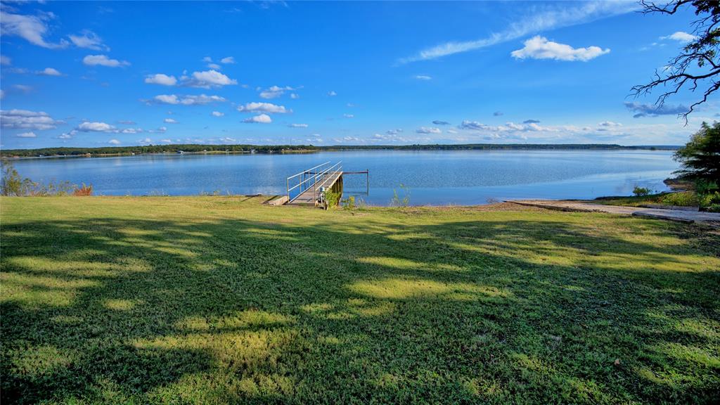 1 Tradewinds Nocona, TX 76255 - Photo 27 of 37 a view of an ocean and beach