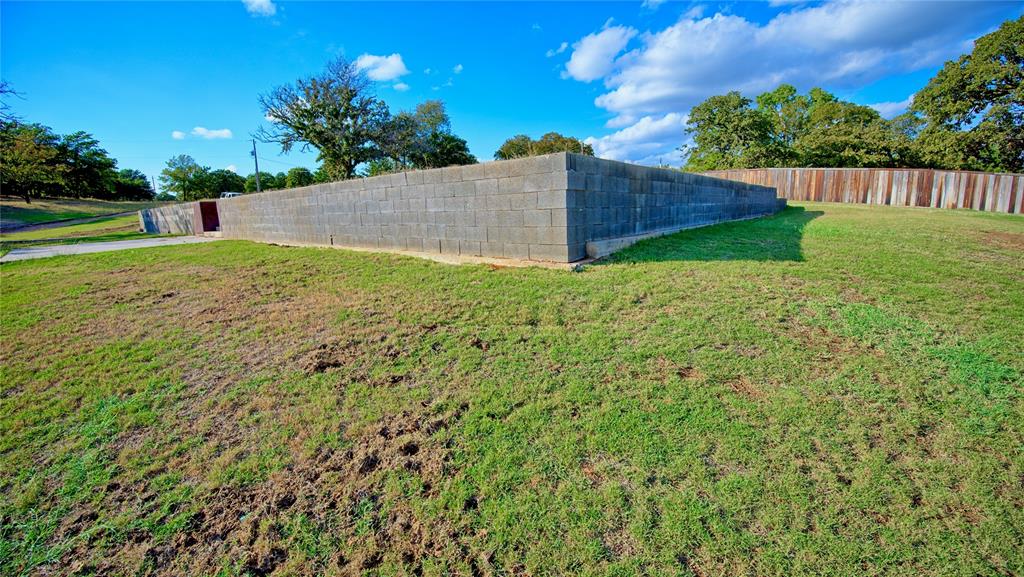 1 Tradewinds Nocona, TX 76255 - Photo 33 of 37 a view of a backyard with a garden