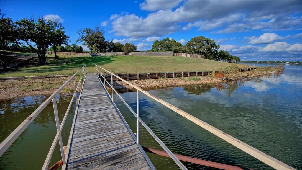 1 Tradewinds Nocona, TX 76255 - Photo 6 of 37 a view of outdoor space and swimming pool