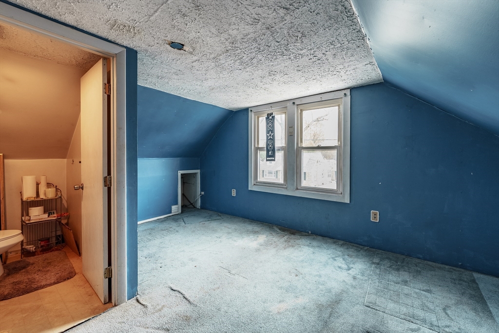 170 Eddy Street Springfield, MA 01104 - Photo 19 of 25 a view of an empty room with a window