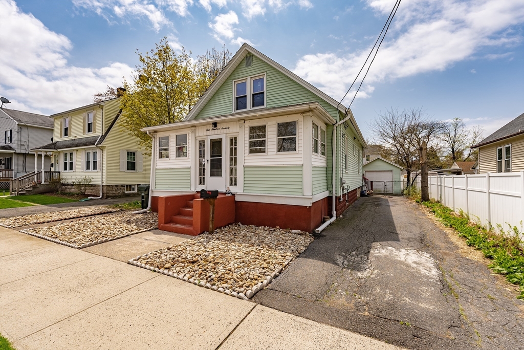 170 Eddy Street Springfield, MA 01104 - Photo 2 of 25 a front view of a house with garden