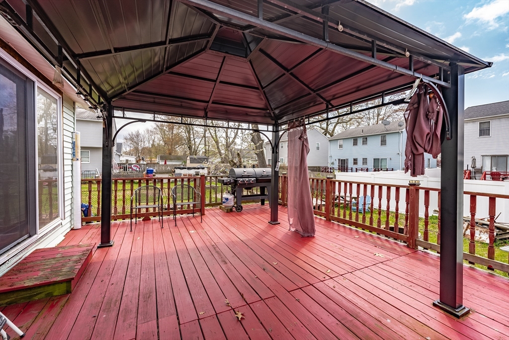 170 Eddy Street Springfield, MA 01104 - Photo 24 of 25 a view of porch with wooden floor and outdoor seating