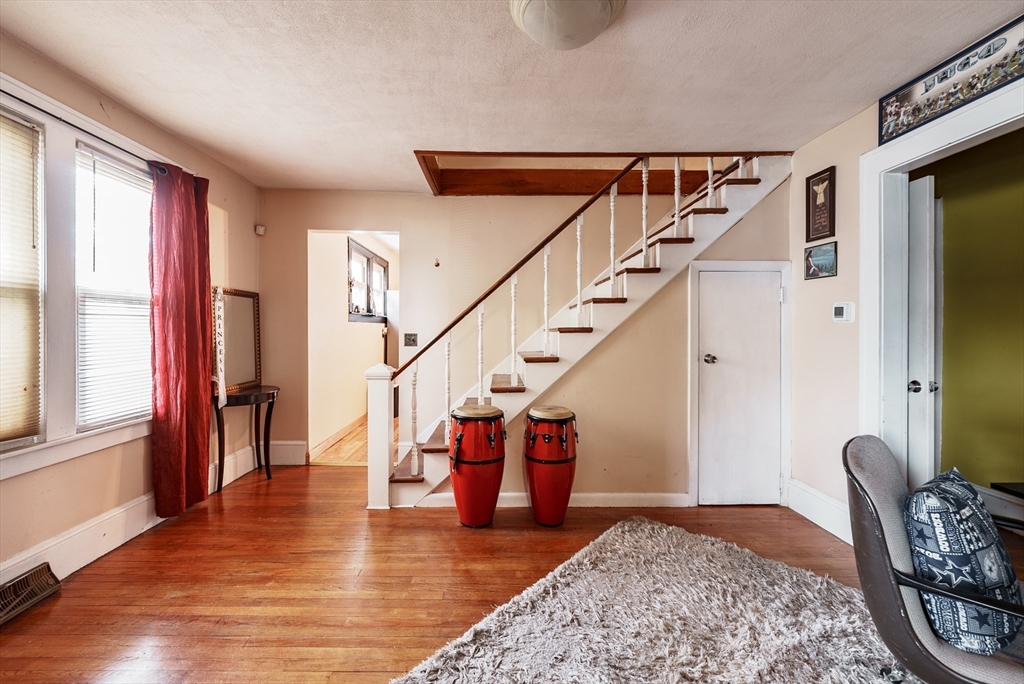 170 Eddy Street Springfield, MA 01104 - Photo 10 of 25 a view of entryway and hall with wooden floor