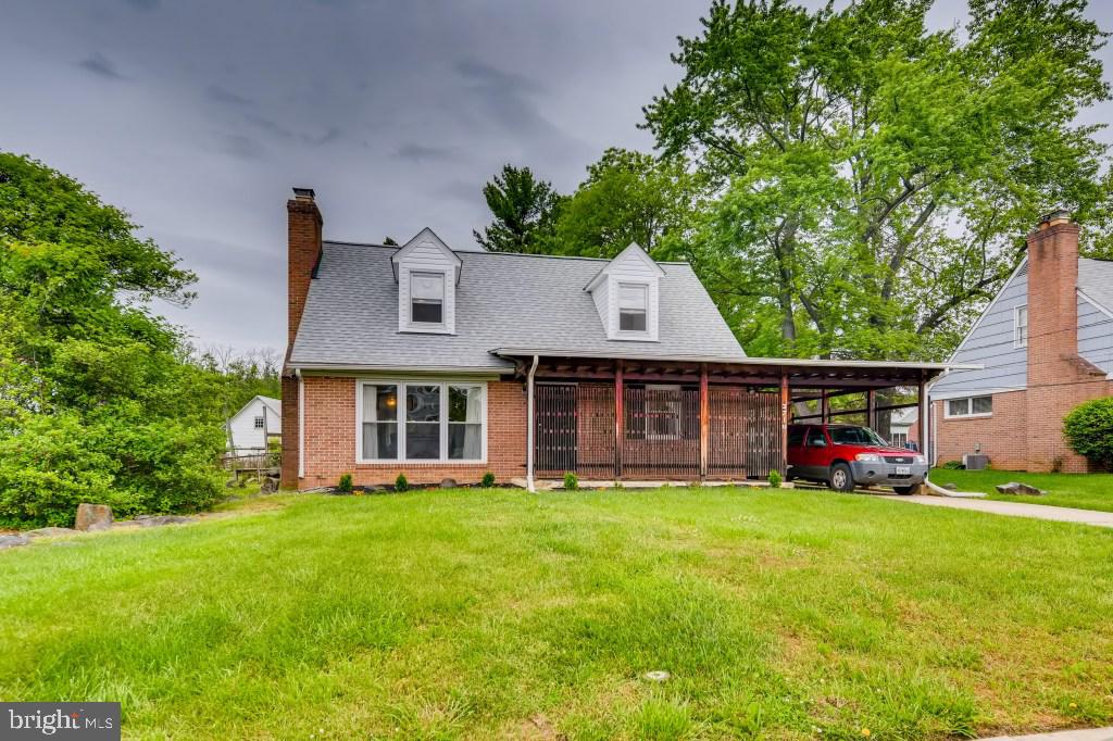 3714 Campfield Road Baltimore, MD 21207 - Photo 2 of 32 a front view of house with yard and green space