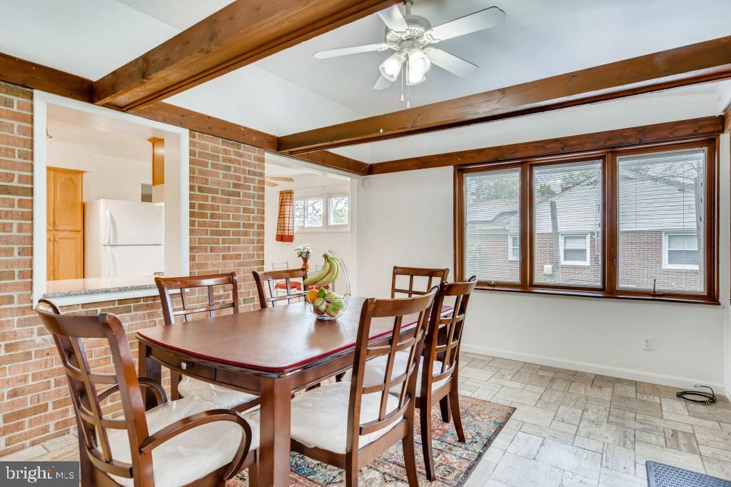 3714 Campfield Road Baltimore, MD 21207 - Photo 13 of 32 a dining room with furniture and window