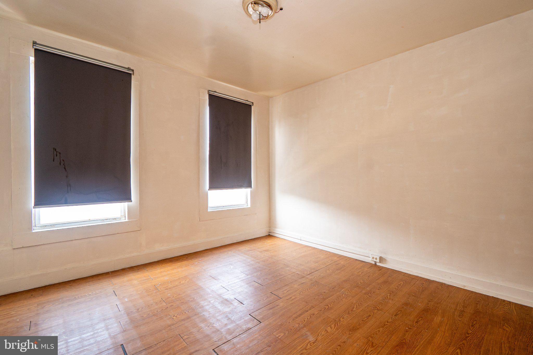 423 Furrow Street Baltimore, MD 21223 - Photo 24 of 24 an empty room with a window