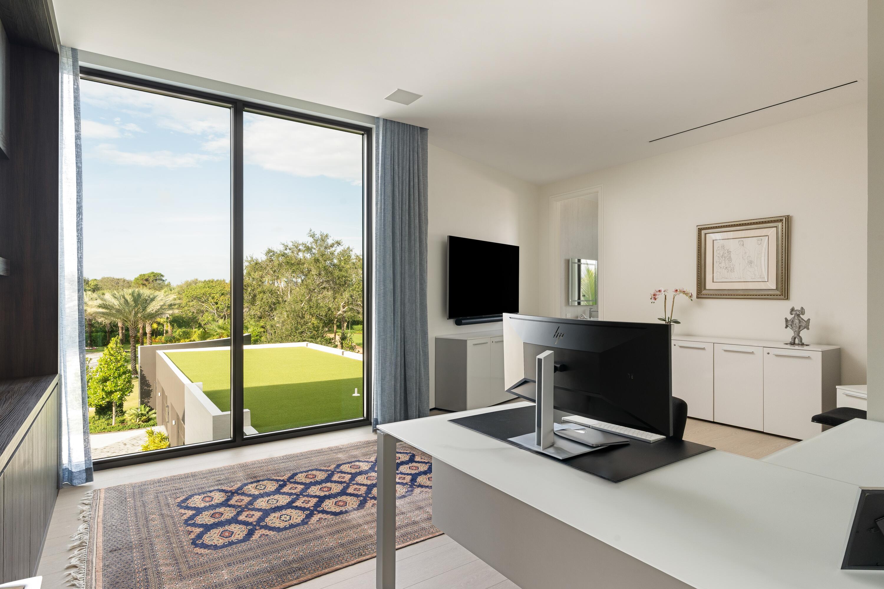 5211 Pennock Point Road Jupiter, FL 33458 - Photo 49 of 69 a view of a workspace with a window