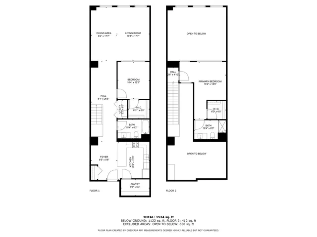a living room with fireplace furniture and a large window