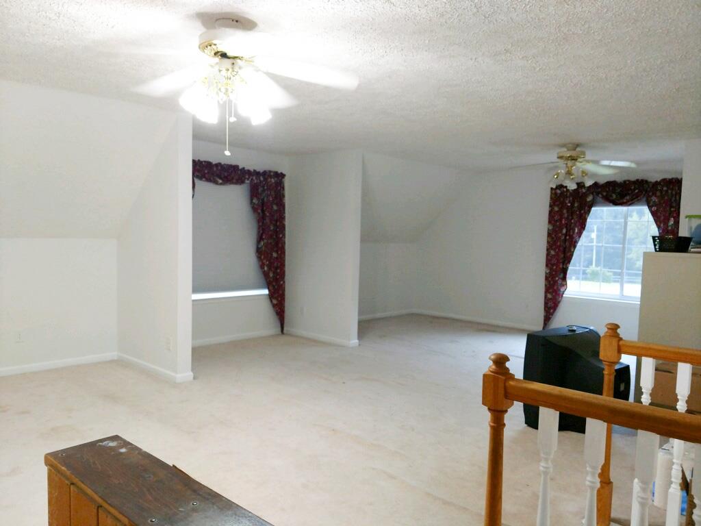 6739 East Benton Road Springfield, TN 37172 - Photo 15 of 29 wooden floor in an empty room with a window