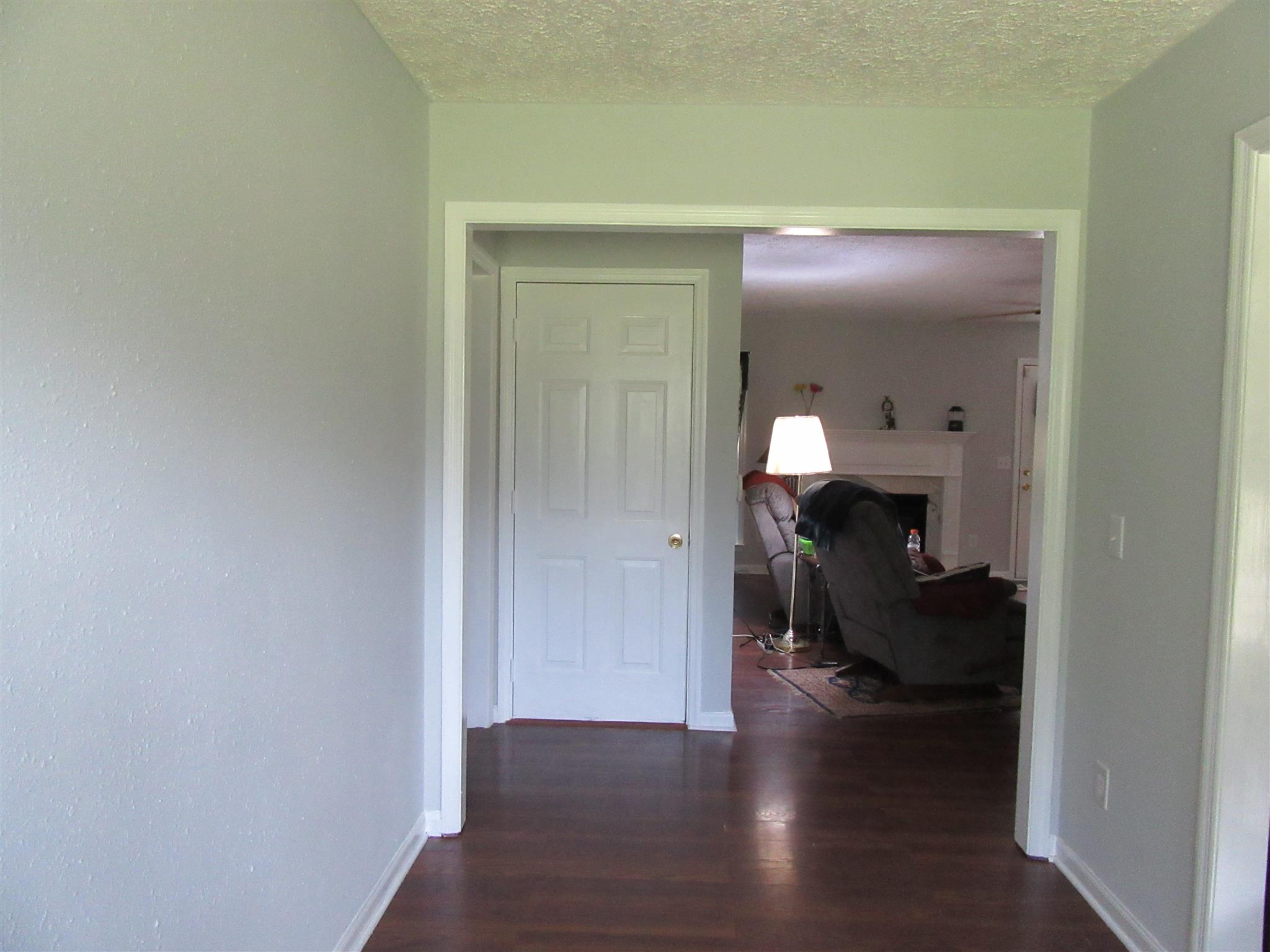 6739 East Benton Road Springfield, TN 37172 - Photo 3 of 29 a view of a hallway to a livingroom with furniture