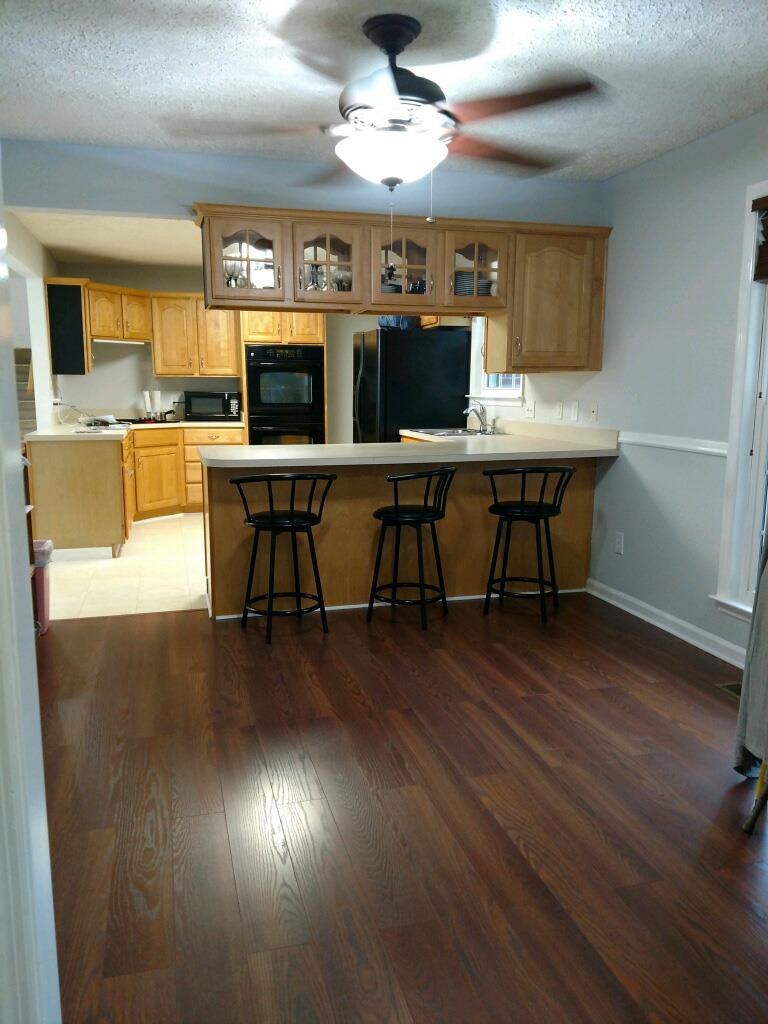 6739 East Benton Road Springfield, TN 37172 - Photo 9 of 29 a view of a dining room with furniture and wooden floor
