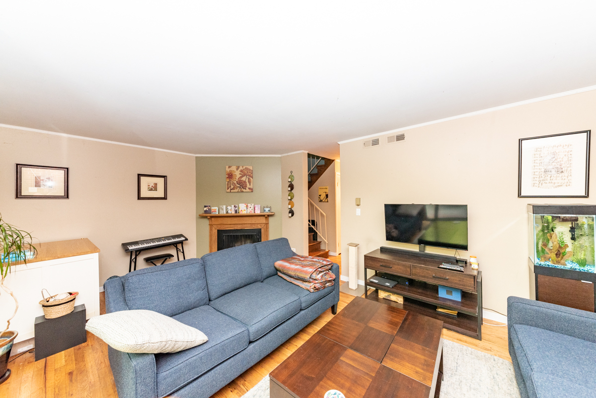 Undisclosed Address Chicago, IL 60614 - Photo 9 of 22 a living room with furniture a flat screen tv and a window