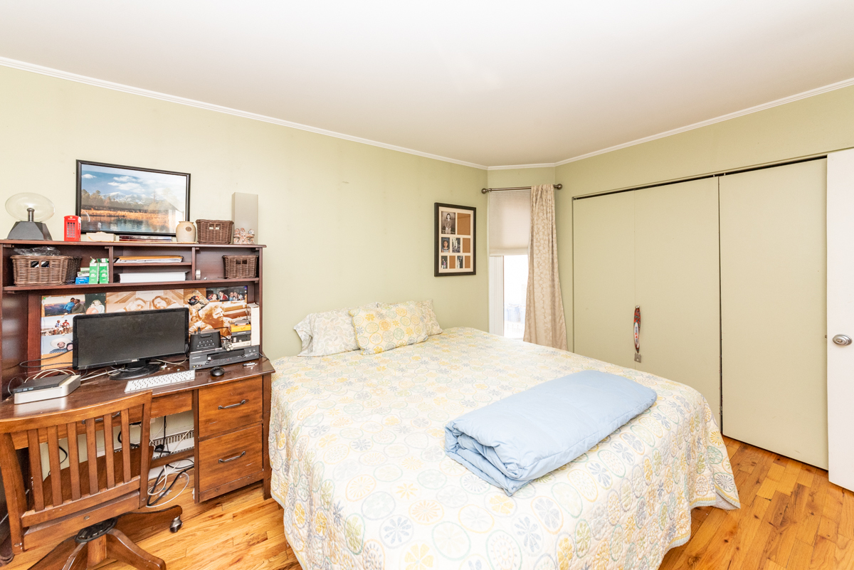 Undisclosed Address Chicago, IL 60614 - Photo 10 of 22 a bedroom with a bed and a flat screen tv