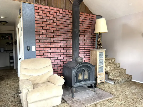 a bathroom with a sink toilet and mirror