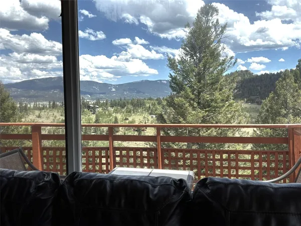 a view of a street from a balcony