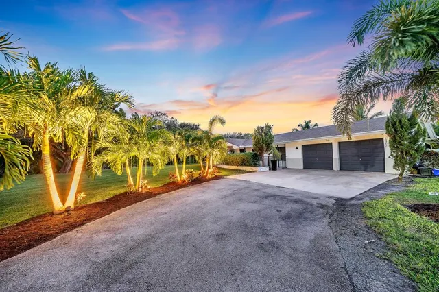 a view of a street with an outdoor space