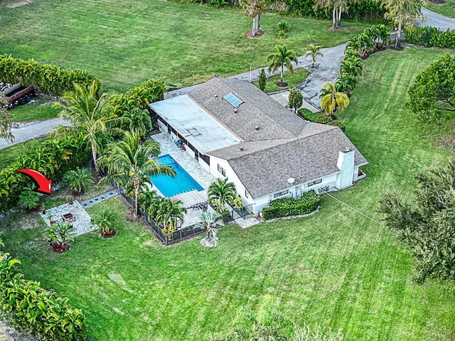 a bathroom with a sink a mirror and toilet