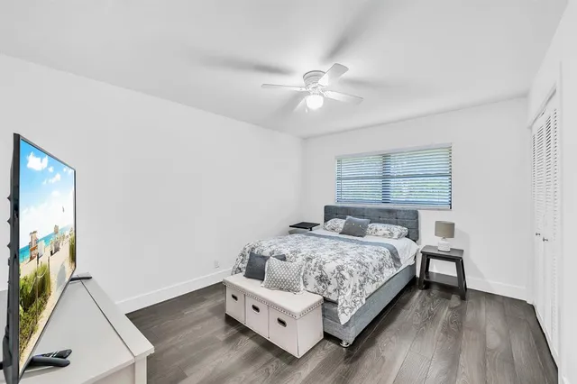 a bathroom with a double vanity sink mirror and shower