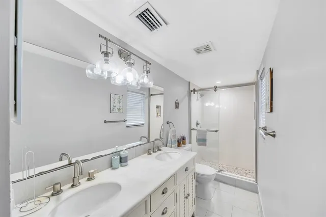 a view of a park with plants and trees