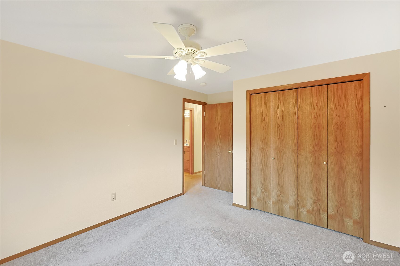 112 Whitewater Way Morton, WA 98356 - Photo 14 of 33 an empty room with a window and a fan