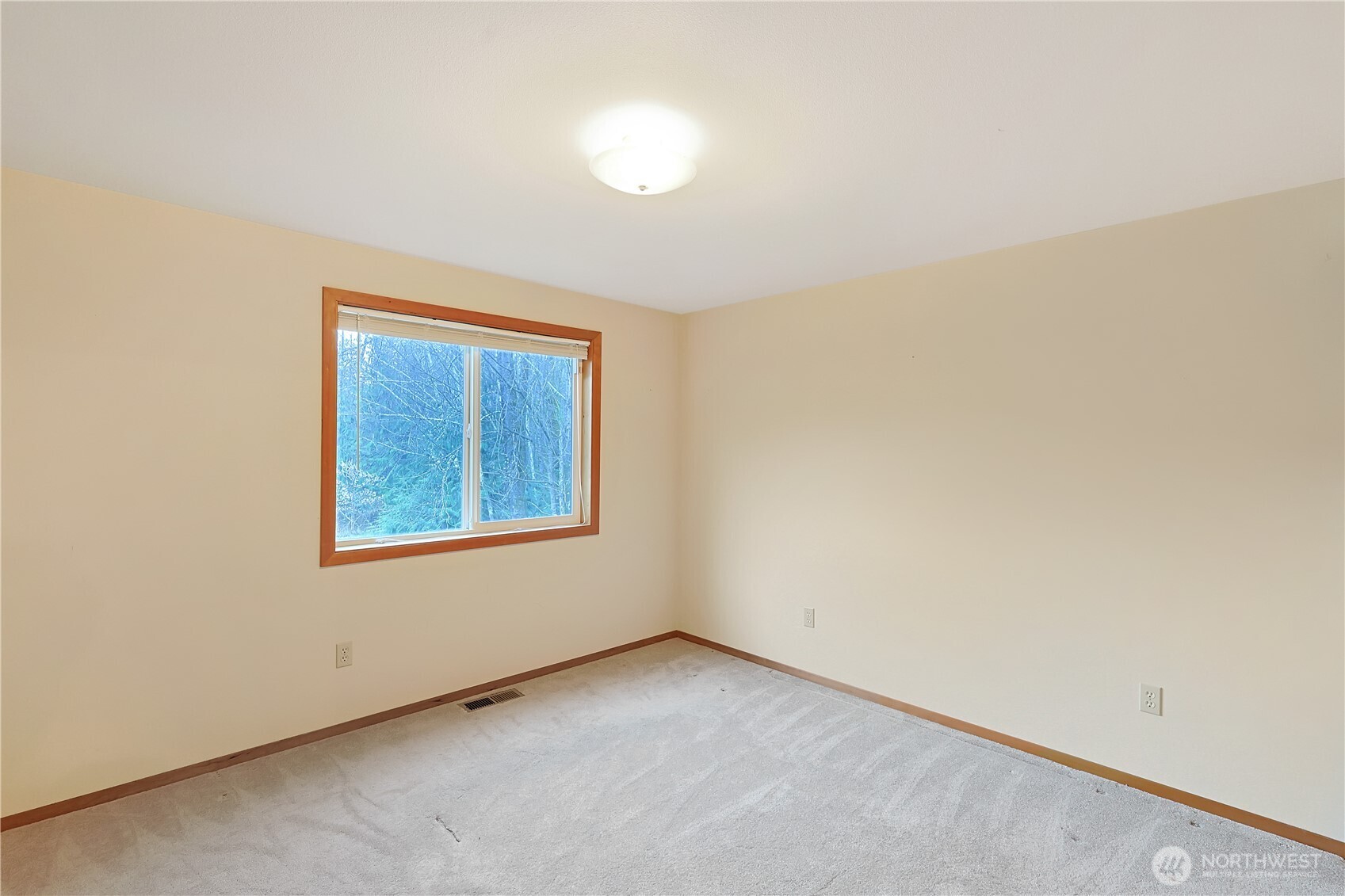 112 Whitewater Way Morton, WA 98356 - Photo 15 of 33 an empty room with windows