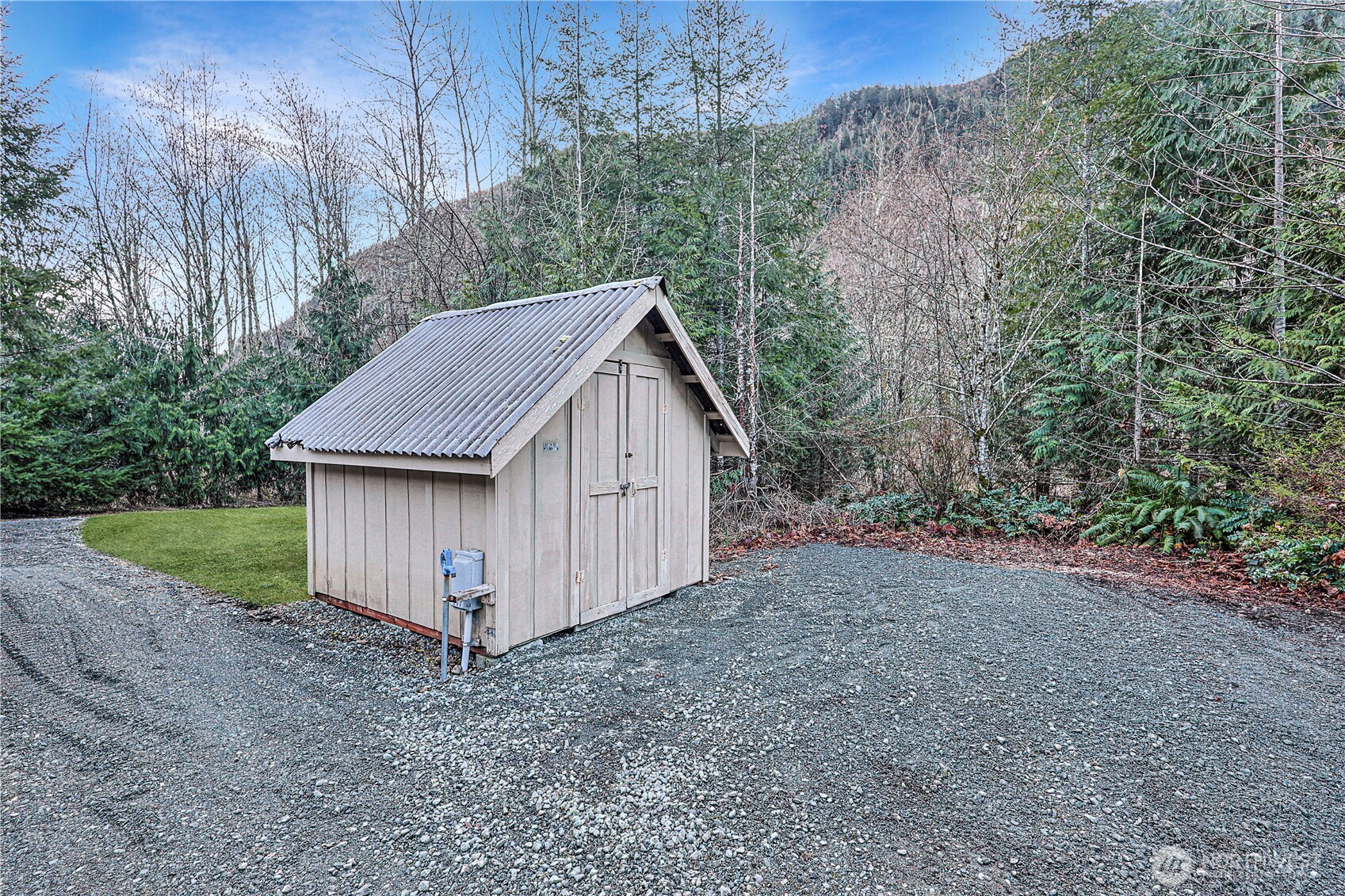 112 Whitewater Way Morton, WA 98356 - Photo 19 of 33 a view of a barn in the middle of a yard
