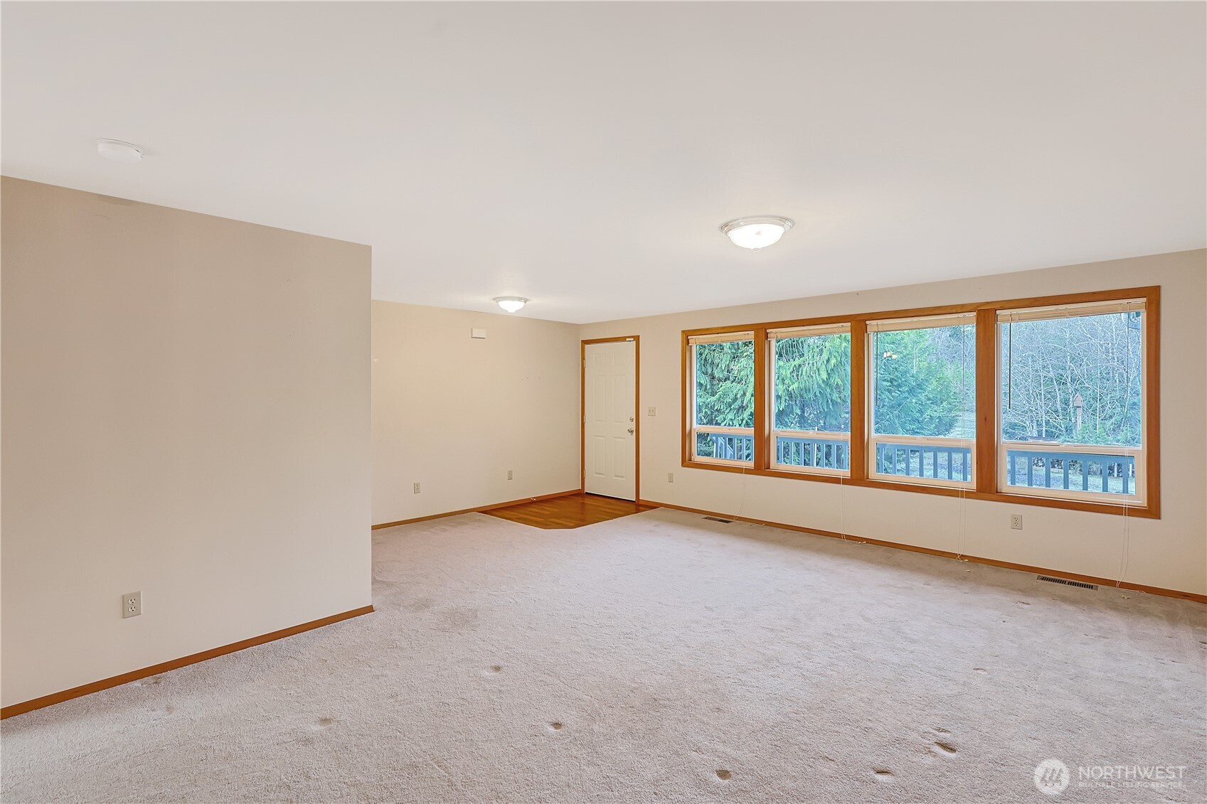 112 Whitewater Way Morton, WA 98356 - Photo 2 of 33 a view of an empty room with a window
