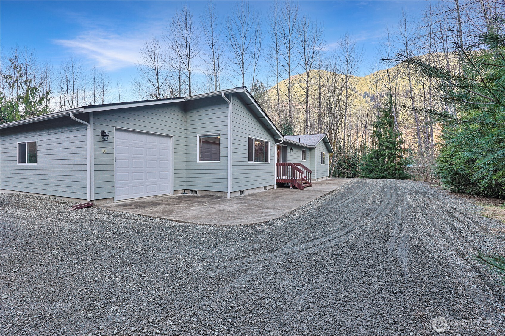 112 Whitewater Way Morton, WA 98356 - Photo 21 of 33 a view of a house with a backyard and garage