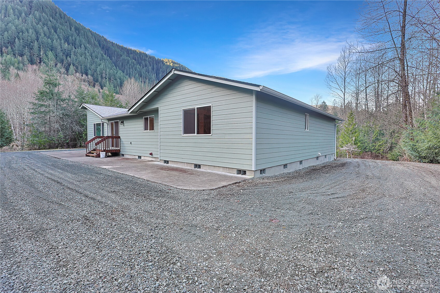 112 Whitewater Way Morton, WA 98356 - Photo 22 of 33 a view of a house with backyard and trees