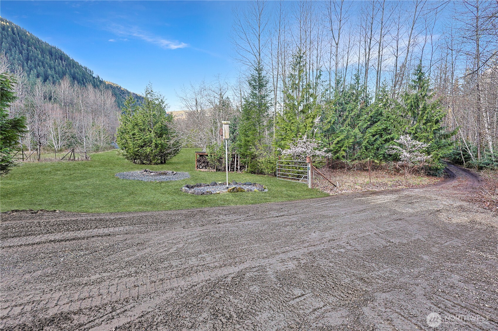 112 Whitewater Way Morton, WA 98356 - Photo 25 of 33 a view of a house with a yard
