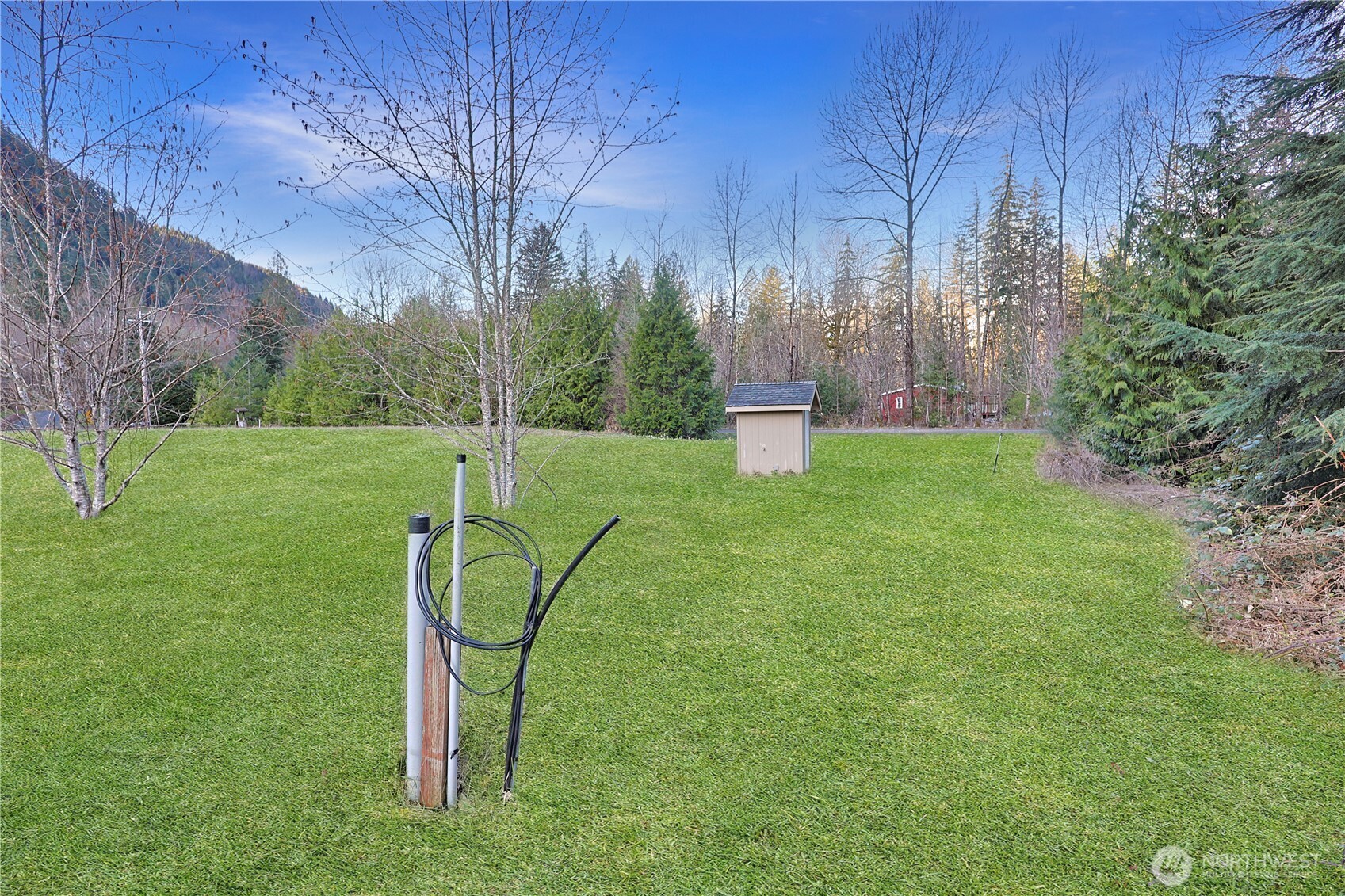 112 Whitewater Way Morton, WA 98356 - Photo 28 of 33 a view of a backyard with basketball court