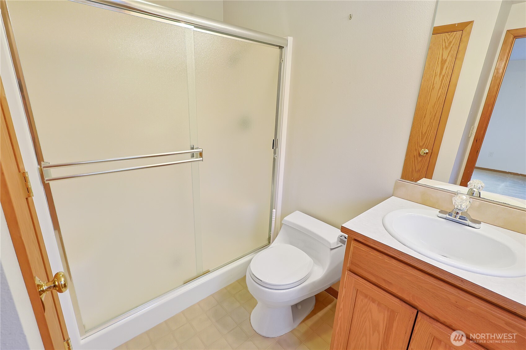 112 Whitewater Way Morton, WA 98356 - Photo 9 of 33 a white toilet sitting next to a bathroom sink
