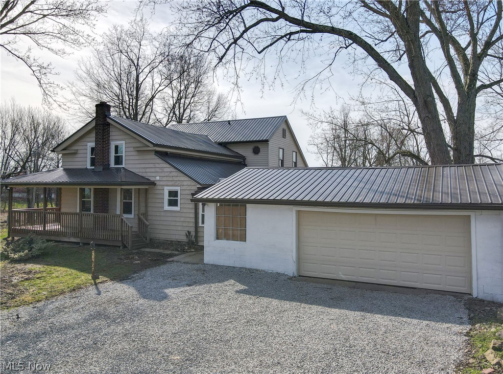 2081 Stroup Road Atwater, OH 44201 - Photo 8 of 48 View of front of house featuring a garage