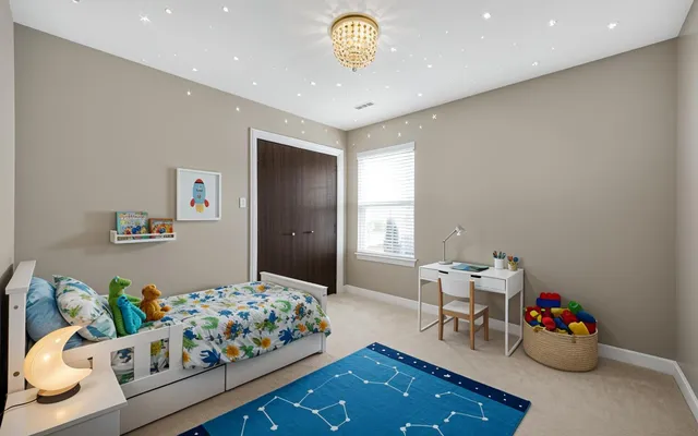 a bedroom with furniture and a bed