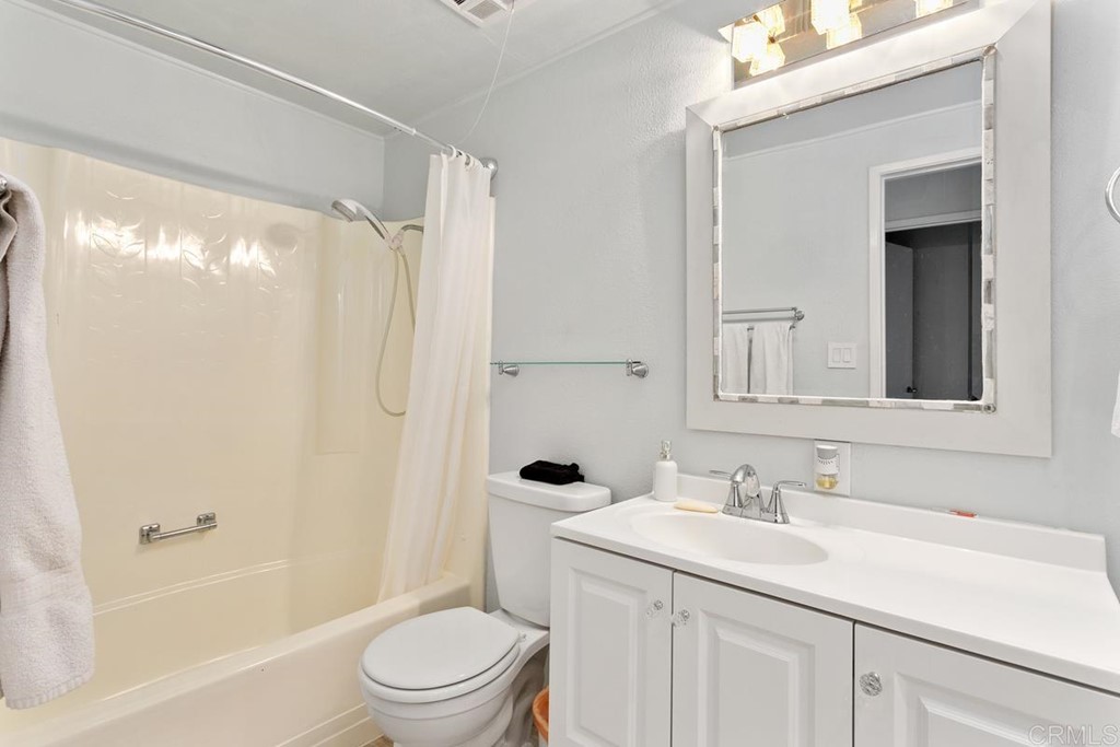 3606 Vista Rey Oceanside, CA 92057 - Photo 12 of 40 a bathroom with a sink toilet and shower
