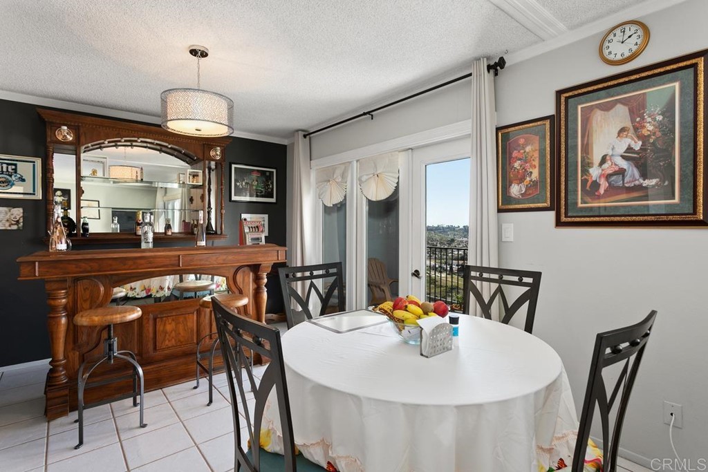 3606 Vista Rey Oceanside, CA 92057 - Photo 17 of 40 a dining room with furniture and window