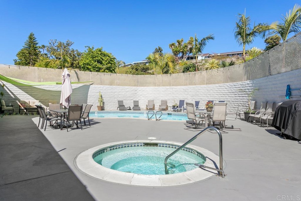 3606 Vista Rey Oceanside, CA 92057 - Photo 32 of 40 a view of a swimming pool with a patio and a yard