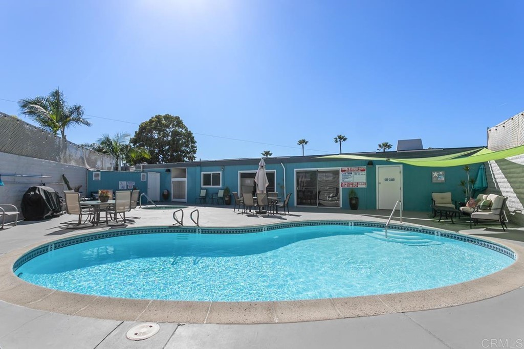 3606 Vista Rey Oceanside, CA 92057 - Photo 33 of 40 a swimming pool with outdoor seating and yard