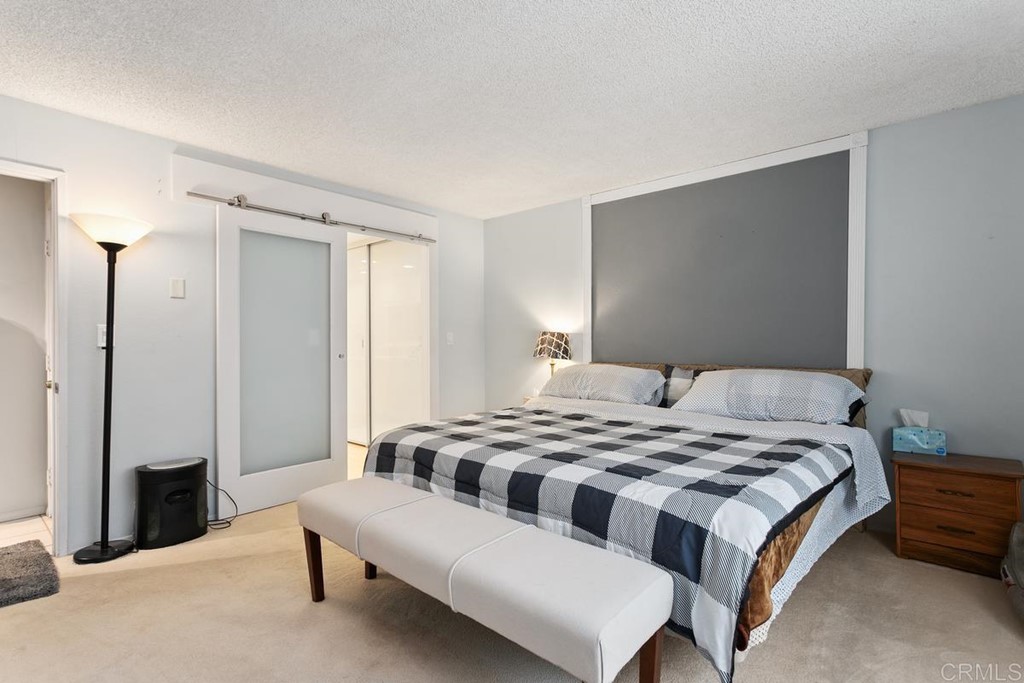 3606 Vista Rey Oceanside, CA 92057 - Photo 6 of 40 a bedroom with a bed and a table