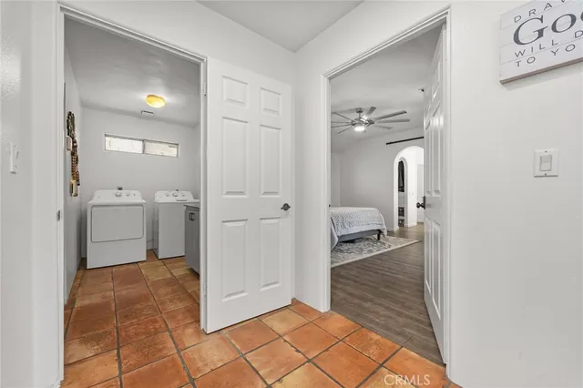 a view of a hallway view with three rooms