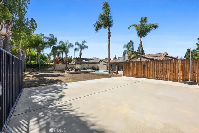 a view of a backyard of a house