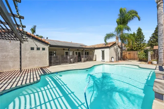 a view of a house with a swimming pool