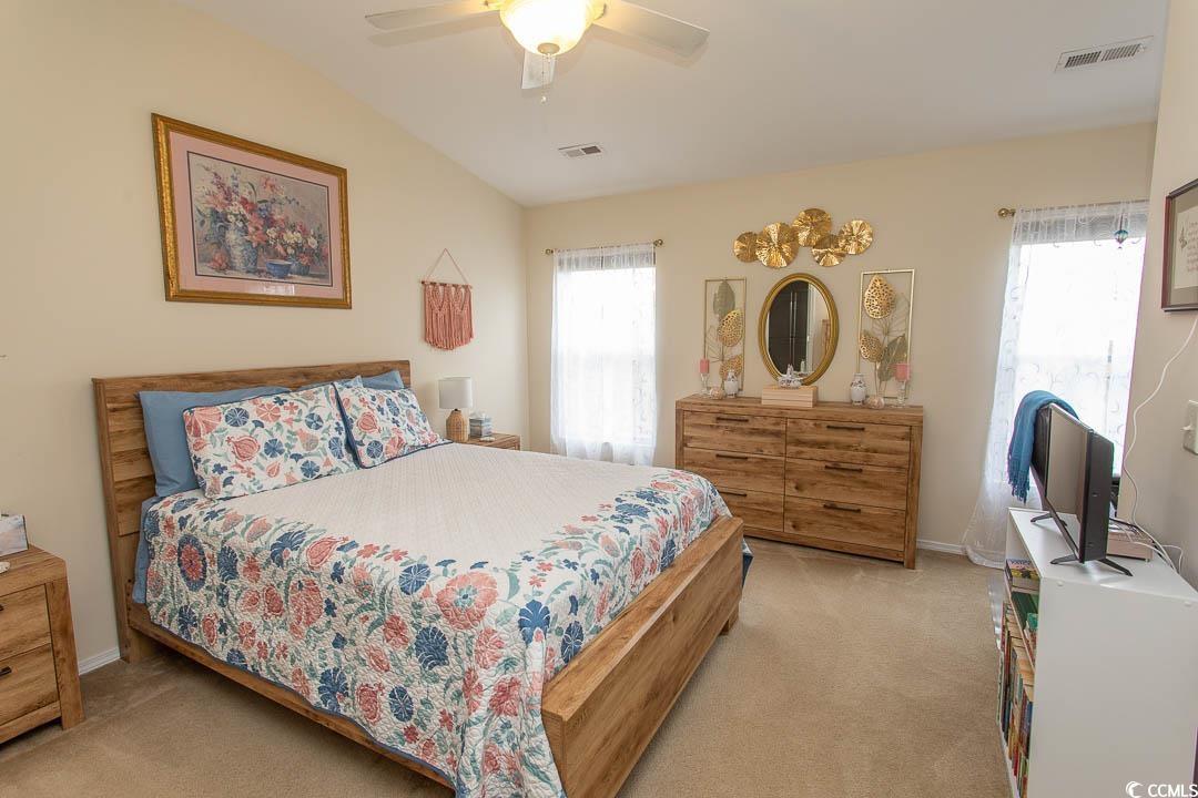 328 Kiskadee Loop, Unit E Conway, SC 29526 - Photo 21 of 37 Carpeted bedroom with ceiling fan and baseboards