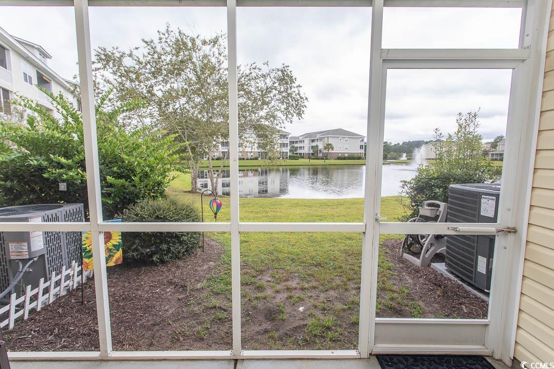 328 Kiskadee Loop, Unit E Conway, SC 29526 - Photo 31 of 37 Sunroom featuring a water view