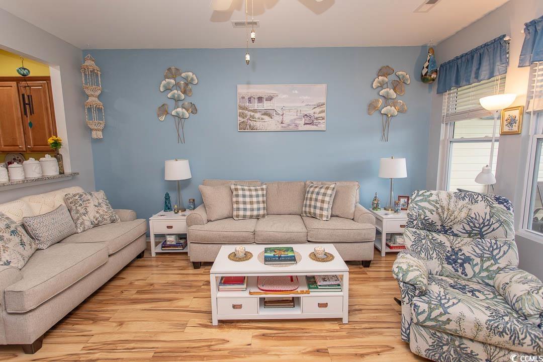 328 Kiskadee Loop, Unit E Conway, SC 29526 - Photo 5 of 37 Living room featuring wood finished floors and ceiling fan