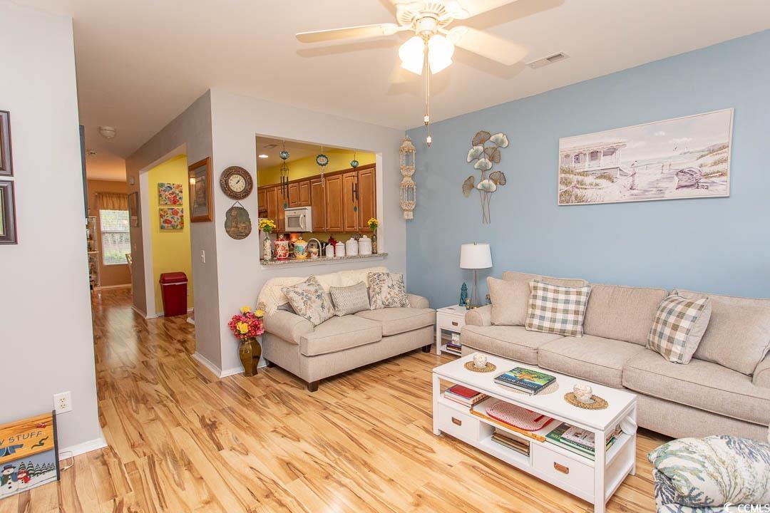 328 Kiskadee Loop, Unit E Conway, SC 29526 - Photo 6 of 37 Living room with light wood-style flooring and ceiling fan
