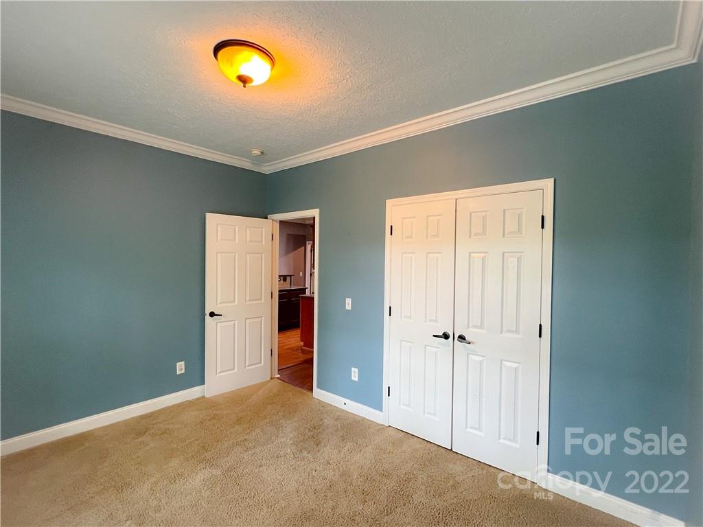 2223 Rodman Road Chester, SC 29706 - Photo 14 of 35 an empty room with closet and mirror