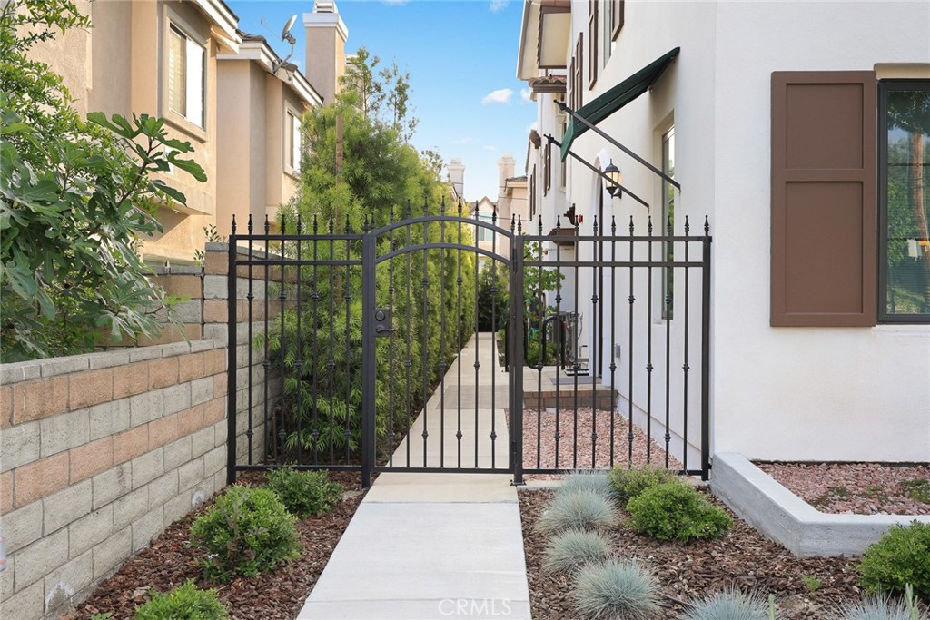905 Sunset Boulevard, Unit A Arcadia, CA 91007 - Photo 3 of 35 a view of a wrought iron fences in front of house